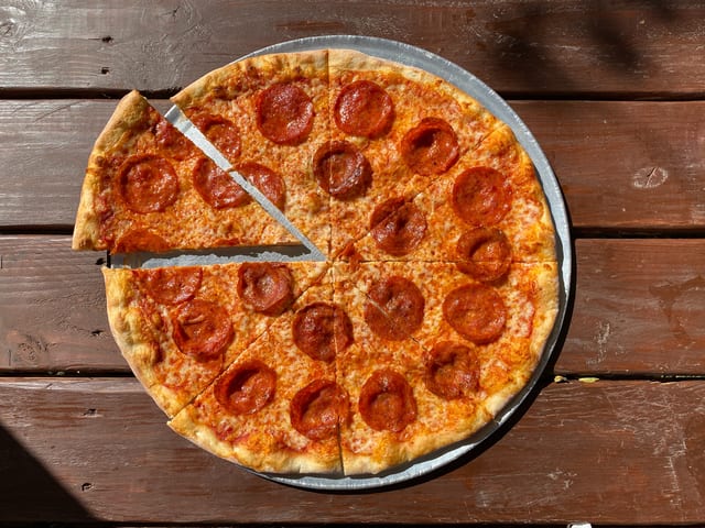14" Pepperoni Pizza.